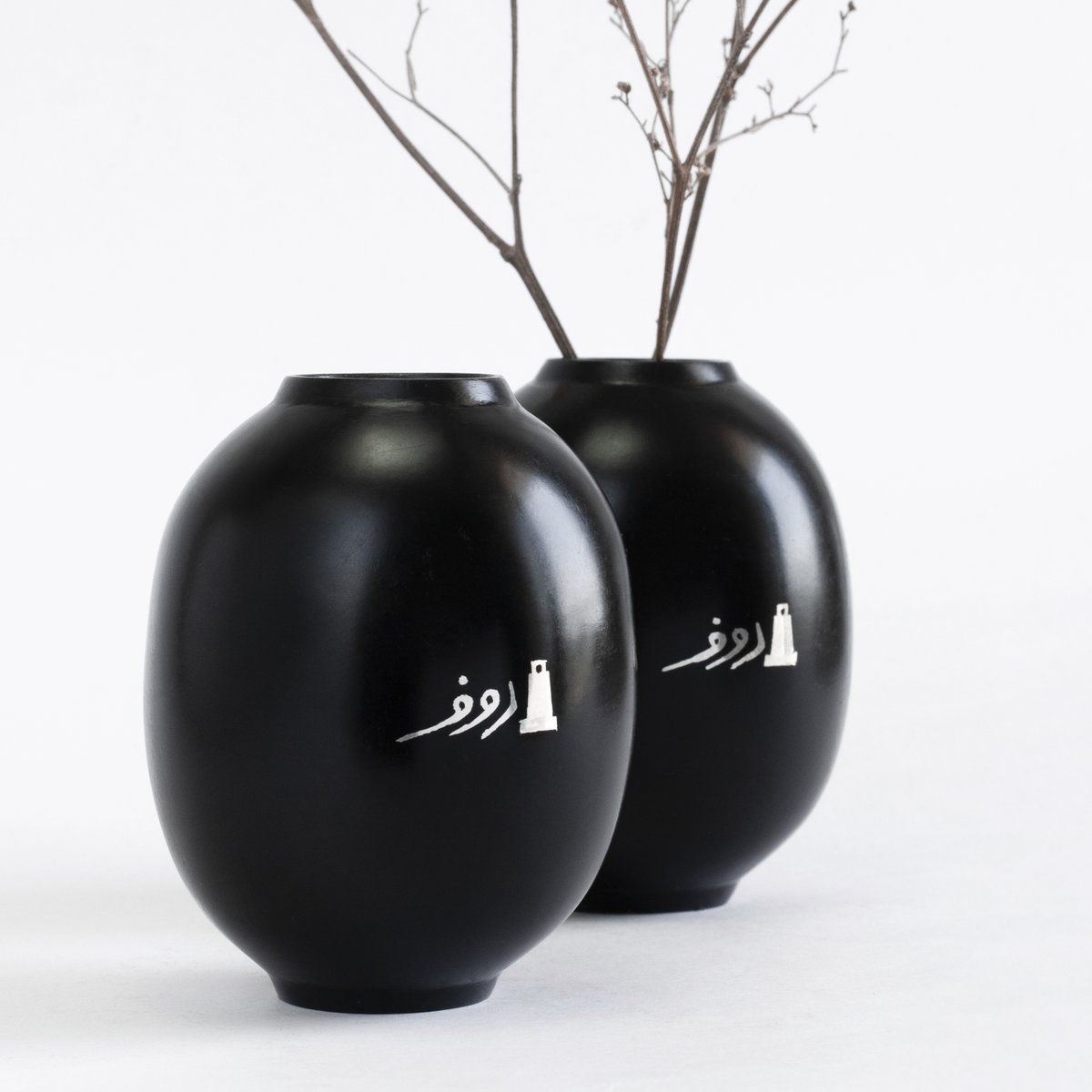 hauptbahnhof's tweet photo. as an experiment in celebrating its provenance, the new #bidriware ROUF VASE prominently features its maker's signature (mohd. abdul rouf) next to an icon of a prominent historical monument in his neighbourhood. available only at: https://t.co/riein3Z3ql #towithfrom https://t.co/wYaRCgkDTY