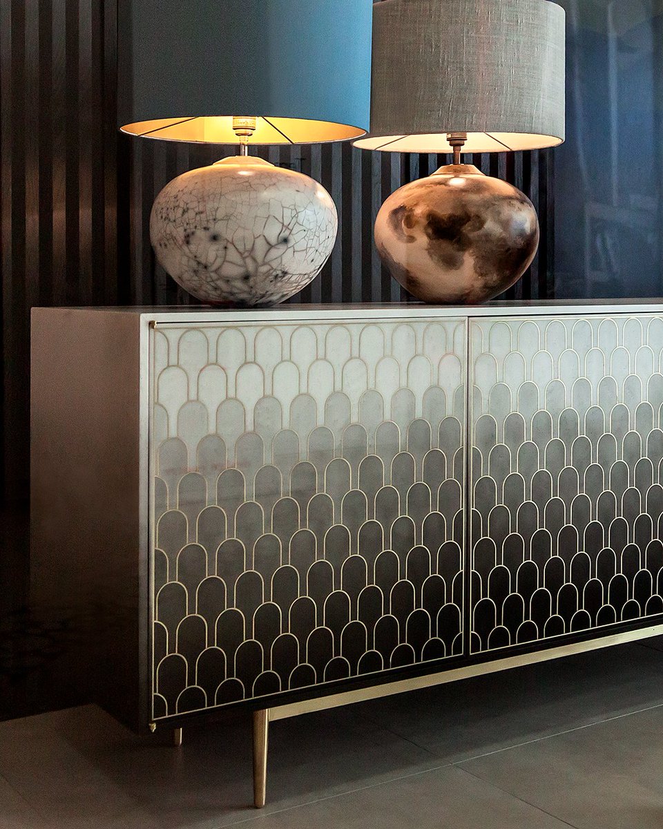 bellafigurauk's tweet photo. Our Fornax lamps in two exquisite smoke fired clay finishes; Desert & Cinder. Wonderfully in keeping with the beautiful Nizwa #cabinet features by @bethanhgray #windowdisplay #lightingdisplay #smokefiredceramics https://t.co/Vm8SxPQv9p