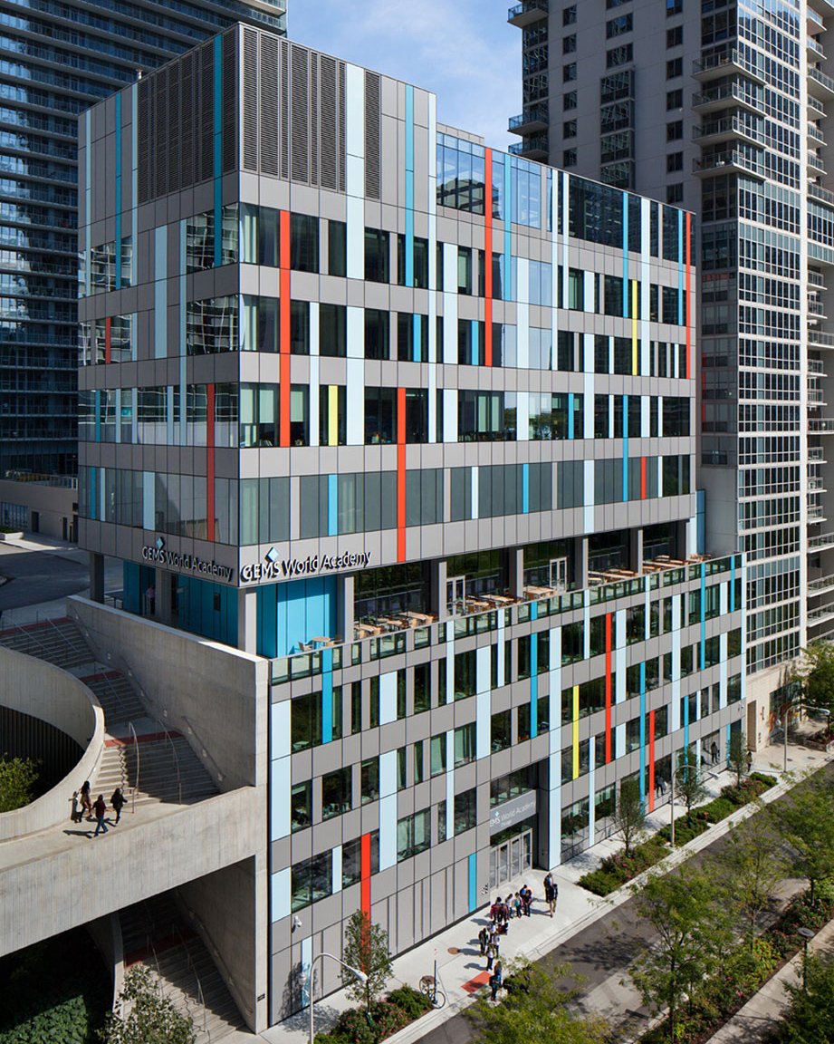 thomaspkerwin's tweet photo. Juxtaposed against an adjacent park, the playful exterior of @bKLarchitecture's @GWAcademyChi is a modernist composition of interlacing colored panels and glass. #PowerConstruction https://t.co/NiD3KPNyD8 https://t.co/R9uapbx3Is