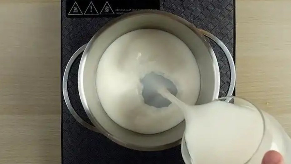 Simmer 3 cups of milk to make a custard ice cream base