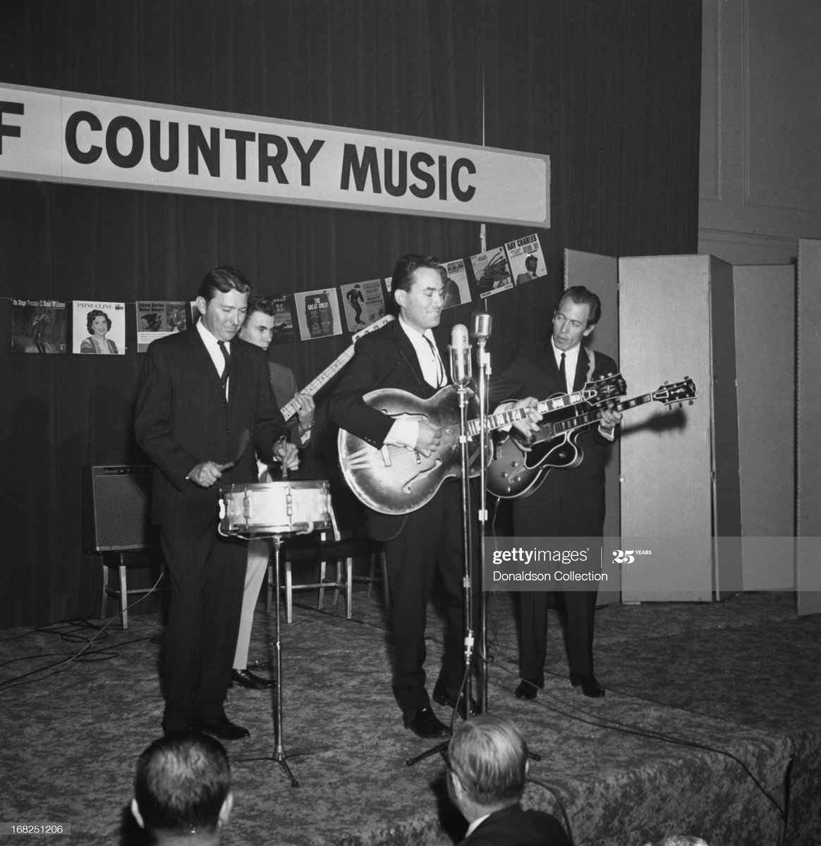 But the industry did not ignore the albums. Instead, in demonstrations to advertisers it heralded them as evidence of country music's modernity & hipness to the times, as seen here in 1963. One of the albums is shown hanging behind Don Gibson, who wrote "I Can't Stop Loving You."