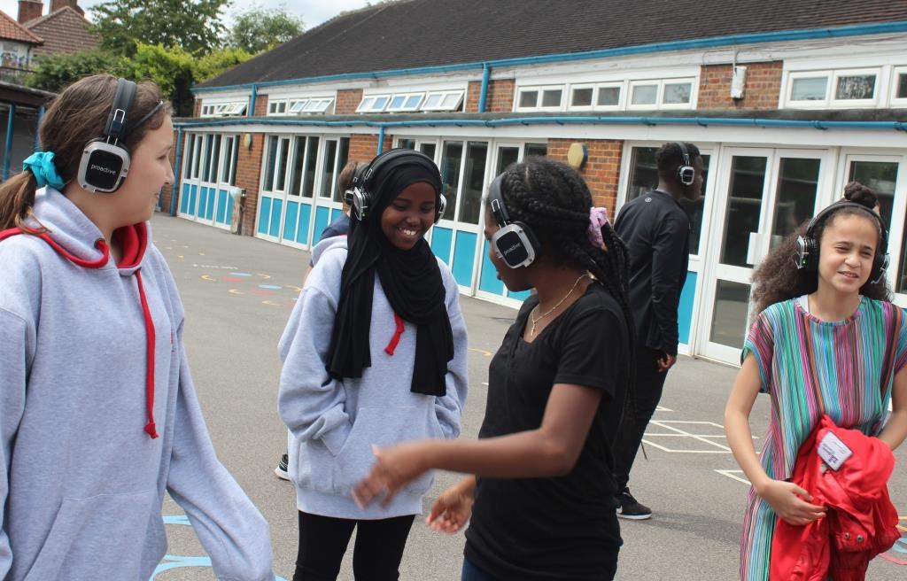 WPS_Success's tweet photo. An emotional Woodcroft Y6 leavers event today - A socially distanced, outdoor, silent, disco 🕺 Followed by video messages from around the world by all of their teachers, past and present 🗨️  Loads of great memories! Good Luck Year 6 https://t.co/yq9tJFjKvB