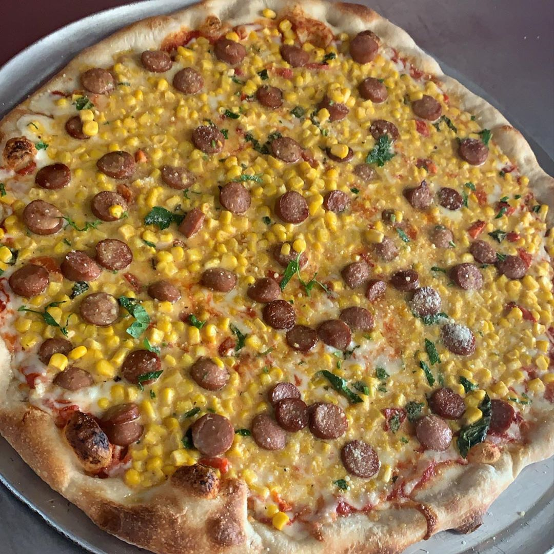 Hot Dogs + Pizza... do they #GetAlongFamously?⁠ 

What are some of the most surprisingly delicious 
pizza toppings you've tried?

📷: <a href="/joegrisafi/">Joe G</a>