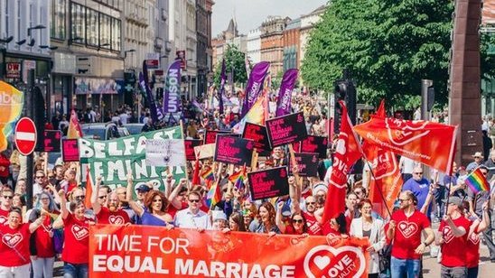 AmnestyNI's tweet photo. Northern Ireland: Religious same-sex weddings made law in ‘landmark day’

First weddings can take place from September

Campaigners now call on Government to allow conversion of civil partnerships to marriage – final move needed for full marriage equality https://t.co/K4Y5iCJByl https://t.co/KPpai630GA
