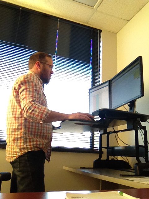 waynorth's tweet image. Back when we could go into the office, stand, and apparently wear checks (pre-rona). #TBThursday