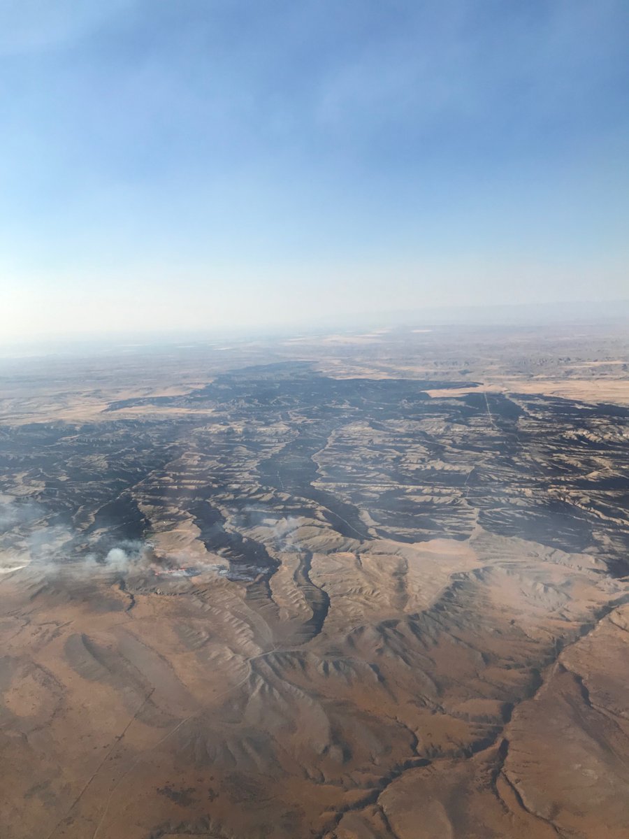 BLMWyoming's tweet photo. The #NeiberFire continues to grow and is now up to 13,159 acres. The conditions are still hot, dry and windy. The Wyoming Type 3 team will take command later today. Firefighters from several agencies are working hard to overcome the challenges of the difficult terrain. https://t.co/5jvafj2Ybg