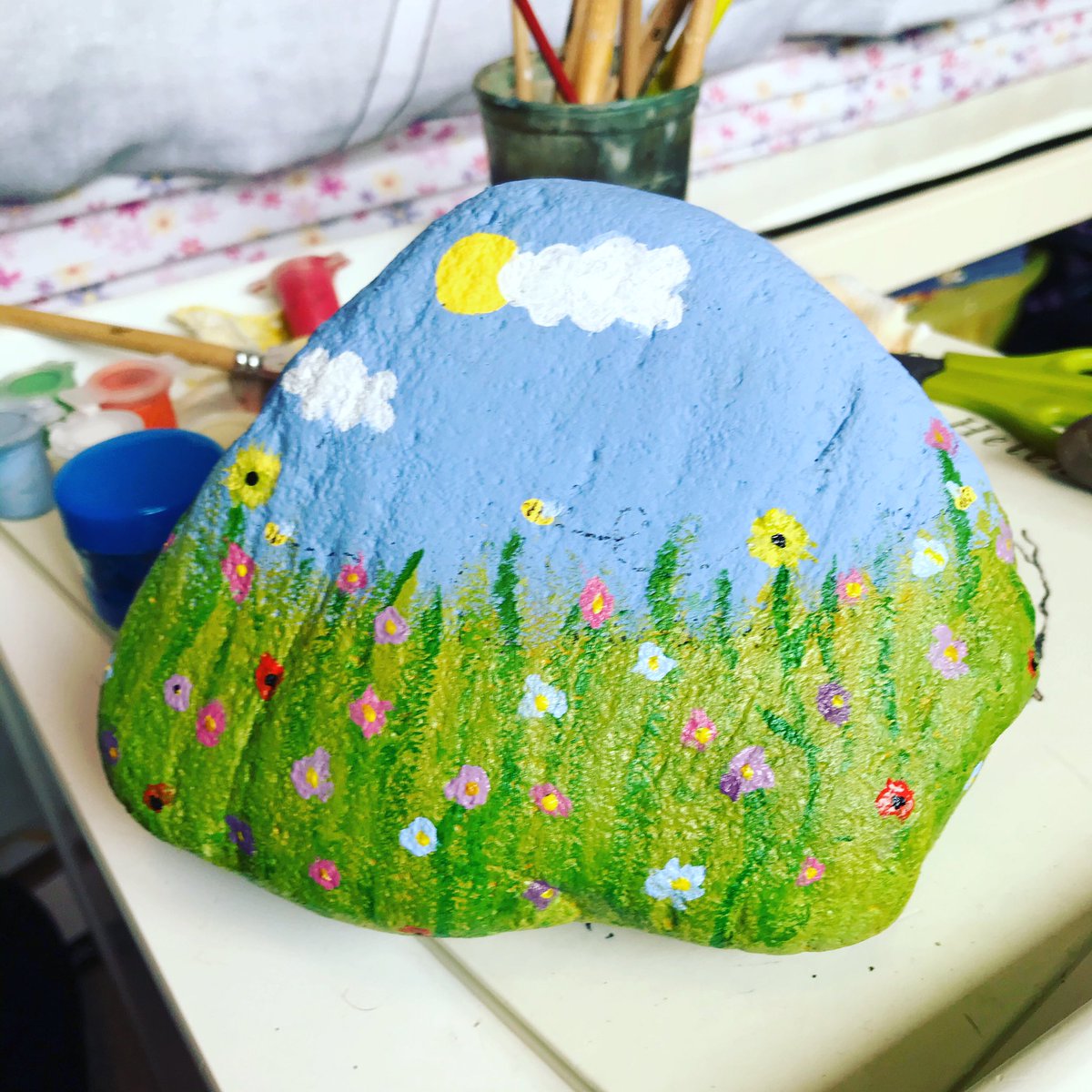 DawnDawnied's tweet photo. Having a break from needle felting with some rock painting @StephCowburn what do you think? Felicity’s sharks, pig and scenery, Charlotte’s bee and flowers and Eva dinosaur, chick and flower pot! https://t.co/9pIdrtjDu3