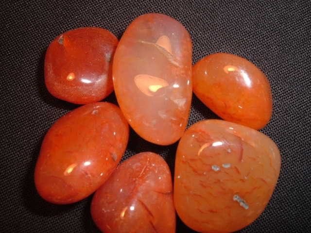 carnelian - light to dark/burnt orange - associated with the sacral chakra - stimulates and boosts creativity and physical energy - helps to encourage higher levels of courage, self-confidence and can aid in being more self-assured - stimulates ambition and drive