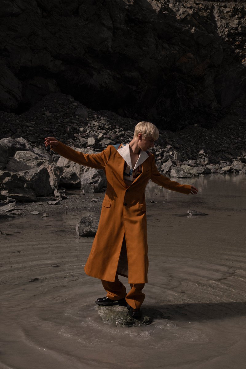 MP10 — Industrial Zone featuring @LANVINofficial 

instagram.com/p/CCtkzQiI2XL/

There is not a single black piece of clothing in the whole collection. The vivid shades of orange, turquoise, and yellow are matched with earthy tones of brown, blue, and green.