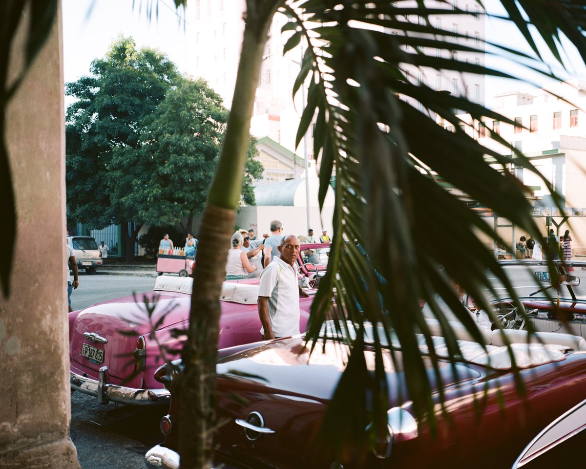 oslenave's tweet image. driver w/ some classic cars in havana, cuba #mamiya7 #portra160
