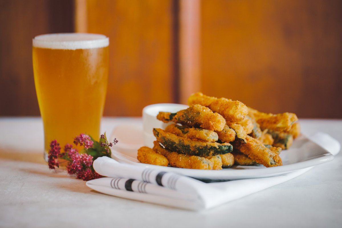The perfect pair! 🍻  Treat yourself to a cold one and Fried Zucchini this afternoon. Make a reservation to dine-in!
sunnysidelodge.com/menus/dining-r…