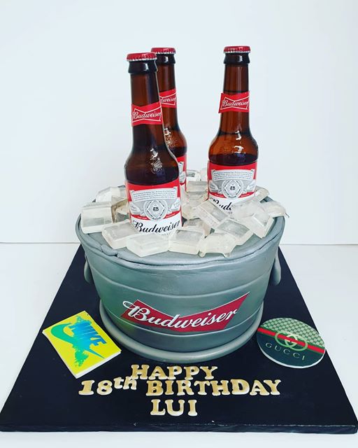 A special 18th birthday celebration. All edible ice bucket with isomalt ice cubes and real bottles of #Budweiser #lager #birthdayboy