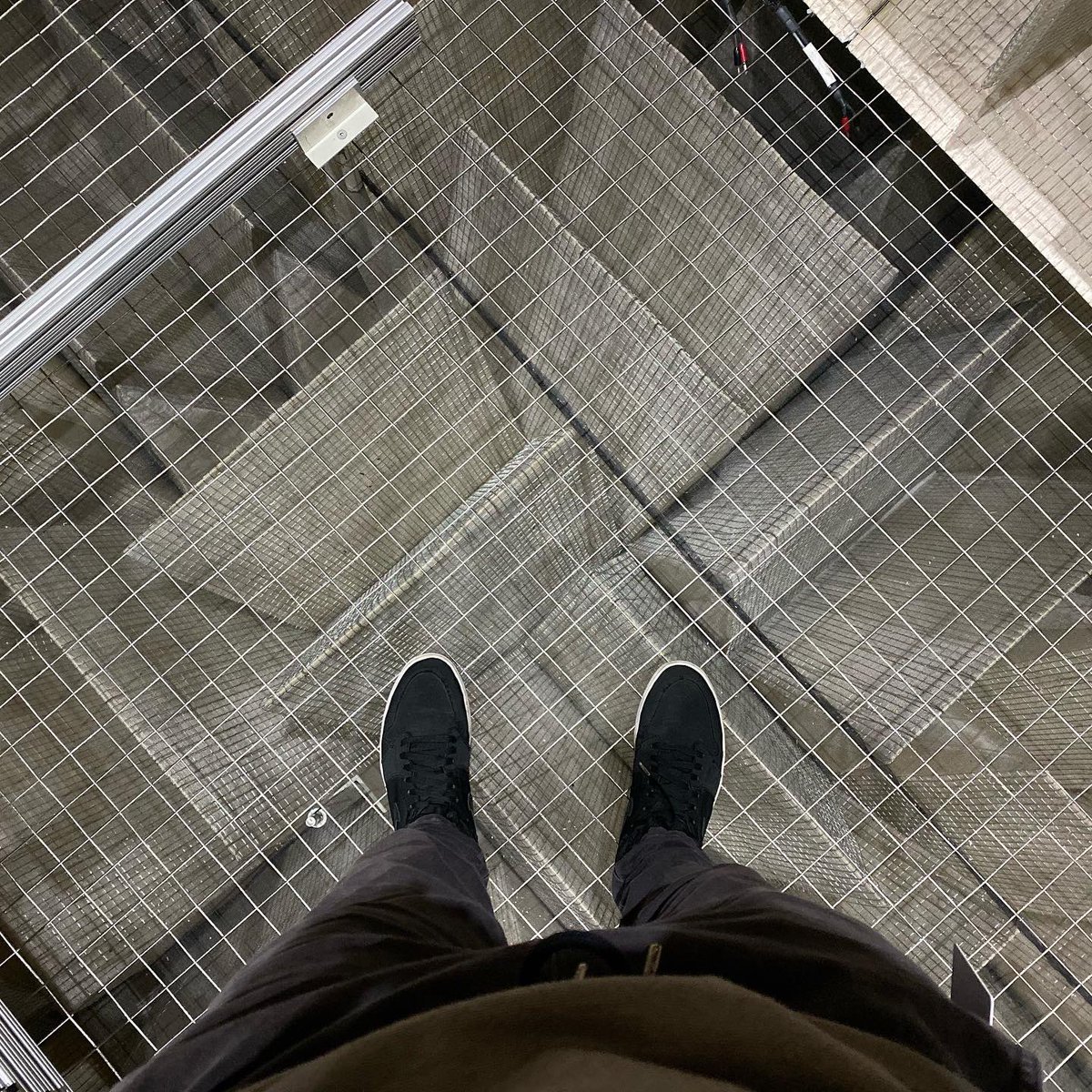 MKBHD's tweet photo. Throwback to visiting the quietest room on earth. It's a sealed room within a room. Every wall is insulated. The door is 4 feet thick. There is no floor, only suspended wire. Sitting still you can clearly hear your heartbeat and your own blood blowing... So yeah, studio goals https://t.co/SOchzWgkEF