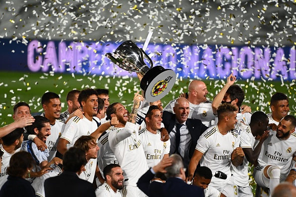 Soccer_Laduma's tweet photo. Real Madrid lifted their 34th LaLiga title on Thursday evening after beating Villarreal 2-1 but had to celebrate without fans. Here are the best images of their coronation. #SLInt https://t.co/USjlfsXoeC https://t.co/adFcvvLiww