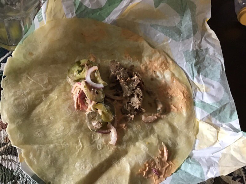 George_Sheppard's tweet photo. @SUBWAY @subwaylistens Ordered two wraps today and delivered by @DoorDash and this is what Subway calls quality. An embarrassment to the Subway brand! Called store and they said take it up with   @DoorDash ! Unreal! That’s my last Subway order. https://t.co/keA4CYs34d