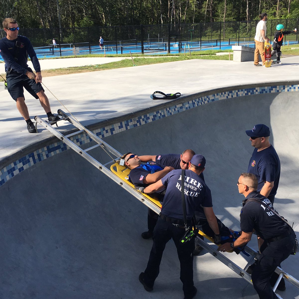SandwichFD's tweet photo. Sandwich F.F.'s this morning participated in a extrication drill @ the newly opened Skate Park on QMH Rd. F.F.'s removed a simulated injured skater after immobilizing him on a spineboard. https://t.co/MgD3Gj0aS7