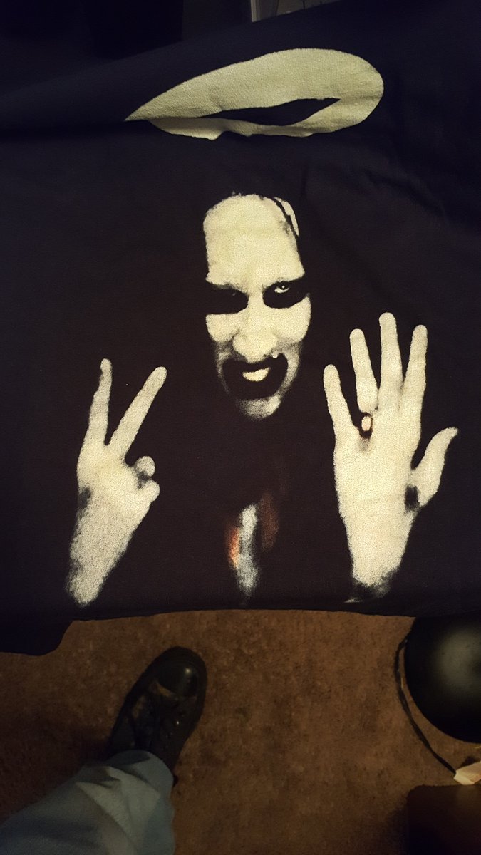 DJ__Sinn's tweet photo. anyone know where to report scamming ebay seller? tried to buy a vintage mm shirt, and definitely not vintage, shitty reprint. even forgot back graphics. I don't spend my money on something because I think its cool, I bought it because it is part of my history. @marilynmanson https://t.co/QJcSZ7zuqa