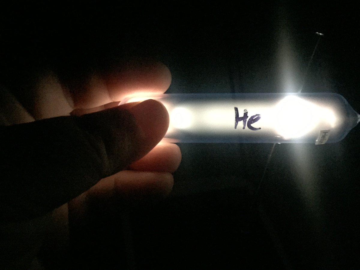 Here's a helium discharge tube with an electric field applied. Larger ampoule than the hydrogen ones, but otherwise the same.  #elementphotos