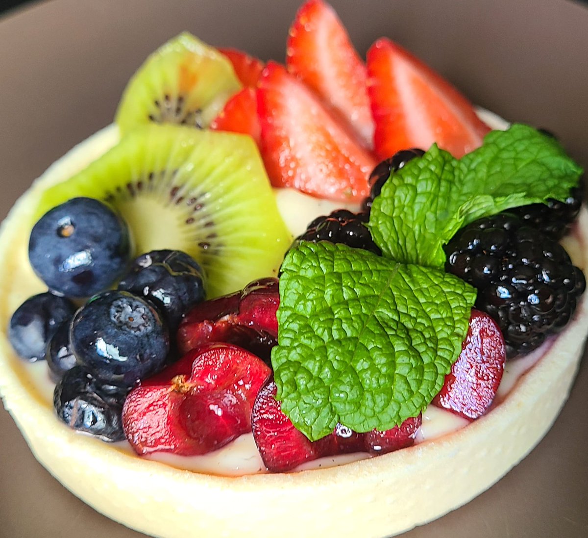 WhippedUpYEG's tweet photo. Have you had a chance to try our new summer berry tart? Full of vanilla bean pastry cream and fresh fruit! It's perfect for these hot summer days we're having 🏖! #yeg #yegfood https://t.co/b958x2k7Rg