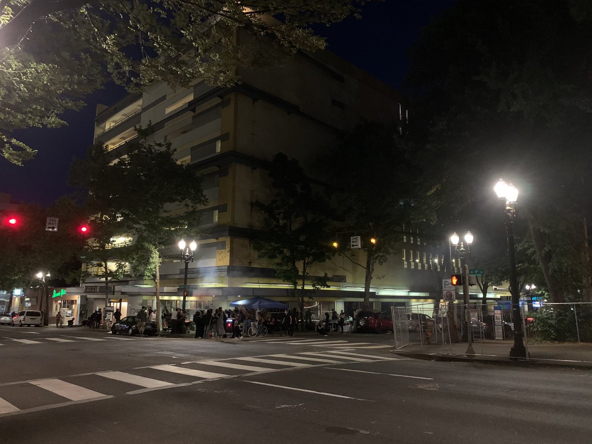 It’s 10 pm at the Justice Center. Chapman and Lawndale are completely fenced off, including the sidewalks. SW Main is open to cars. Riot Ribs is set up on 4th and Salmon. And maybe 100 protesters are gathered outside the courthouse and justice center.