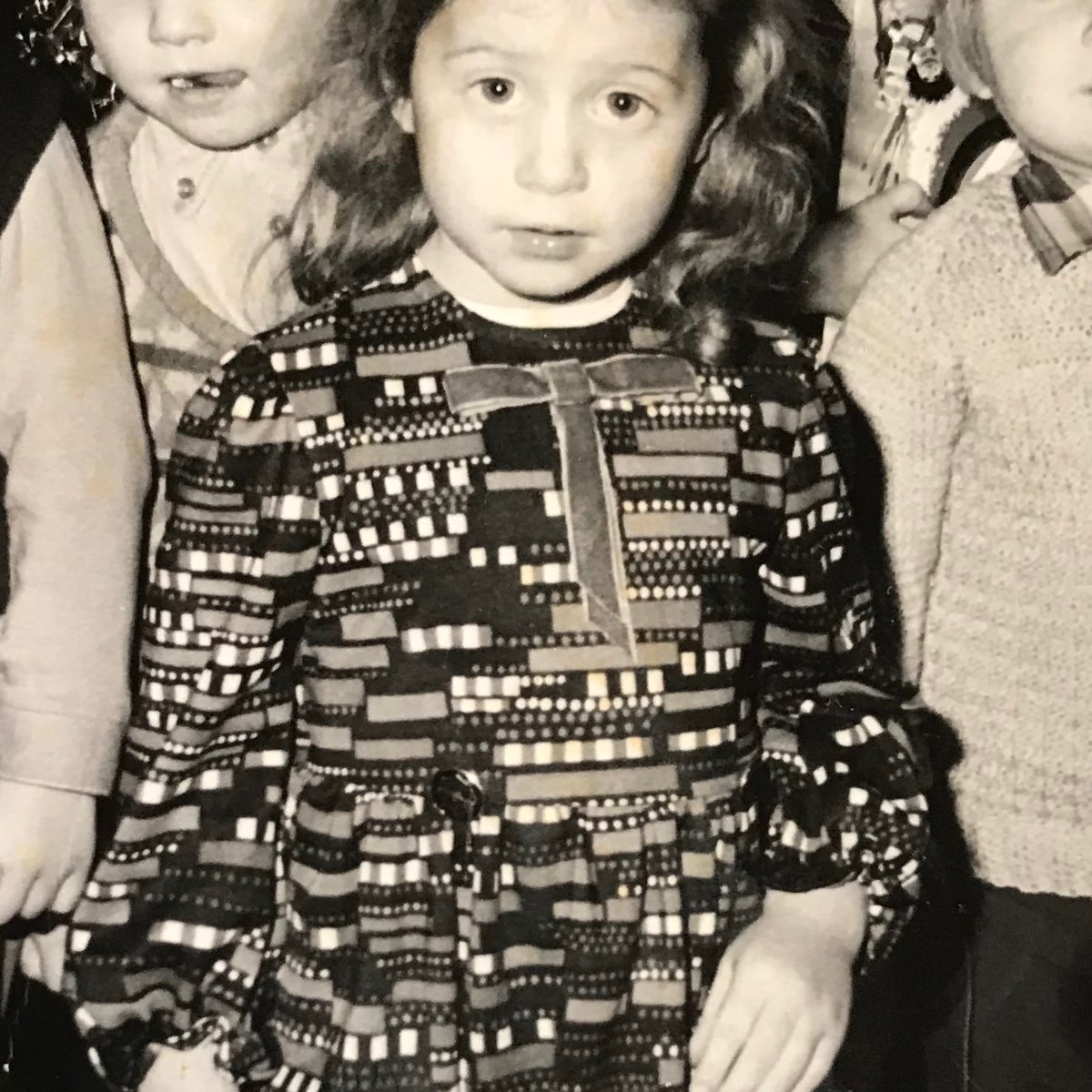 louisemiskell's tweet photo. 'What's your earliest memory of Port Talbot?' Here's me at a Xmas party, Baglan Library, 1973! Port Talbot people, be part of our research project by answering some Qs like this in our online survey: 
English version https://t.co/1o0nWUYGot Welsh version https://t.co/h1UNkJLK2q https://t.co/98MKswMCnc
