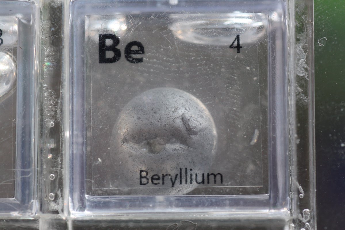 Pic 1: Two pieces of Beryllium, along with a crystal of Morganite, which is a form of beryl (Be3Al2Si6O18) with Mn(II) impurities giving it a pink colour. A green emerald is essentially the same, but with Cr or V impurities. Pic 2: Be sphere.  #elementphotos