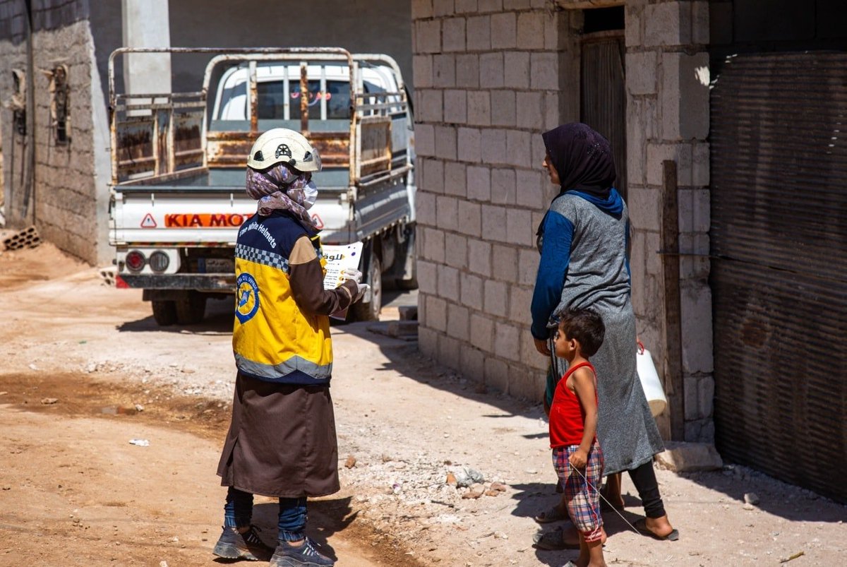 SyriaCivilDef's tweet photo. White Helmets continue their intensive efforts to curb any spread of #CoronaVirus in #Syria, especially in the IDP camps, by making frequent visits for repeated sanitization as well as thorough education for residents on hygiene and safe practices. https://t.co/9KEGRBLxHC