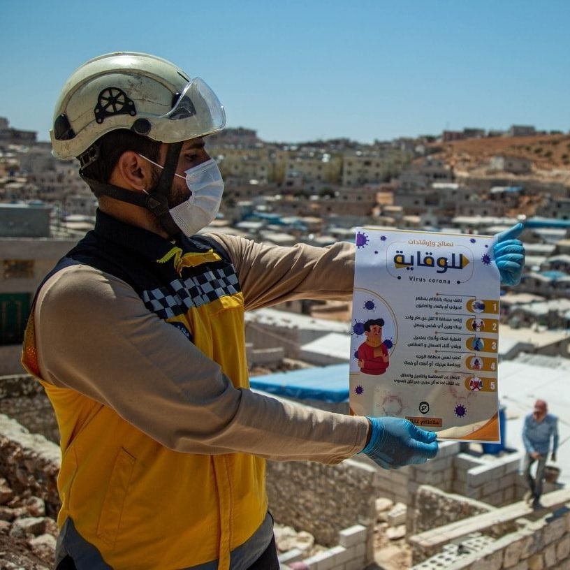 SyriaCivilDef's tweet photo. White Helmets continue their intensive efforts to curb any spread of #CoronaVirus in #Syria, especially in the IDP camps, by making frequent visits for repeated sanitization as well as thorough education for residents on hygiene and safe practices. https://t.co/9KEGRBLxHC