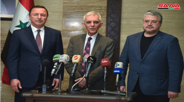 In Syria, Evro Polis representative Ildar Zaripov appeared at an April press conference with the Russian Ambassador and Syria's Deputy Minister of Health, announcing the delivery of Russian COVID aid to Syria. Zaripov is the guy on the right:6/