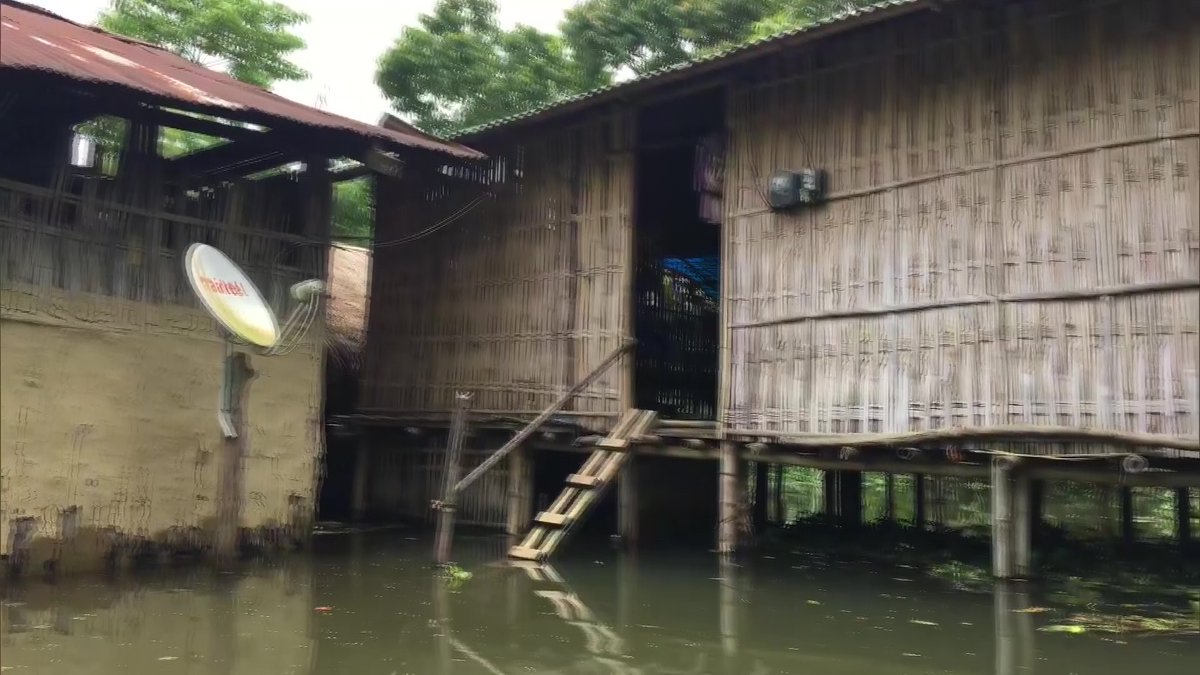 ANI's tweet photo. Assam: Villages in Dibrugarh flooded after the water level of Brahmaputra river rises following incessant rainfall in the region; normal life disrupted. https://t.co/D0T53SkTk3