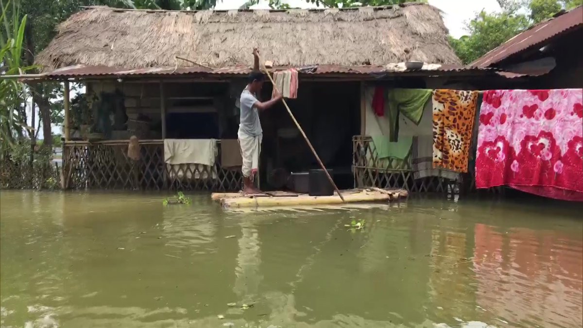 ANI's tweet photo. Assam: Villages in Dibrugarh flooded after the water level of Brahmaputra river rises following incessant rainfall in the region; normal life disrupted. https://t.co/D0T53SkTk3