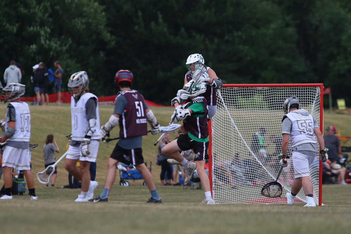 HN_Lacrosse's tweet photo. Sophomore Andrew Mueller celebrates with Sophomore AJ Leopold after the two connect for the tie-breaking goal to put the Ducks ahead in this past weekends semi-finals. https://t.co/7f5XgBdHgr