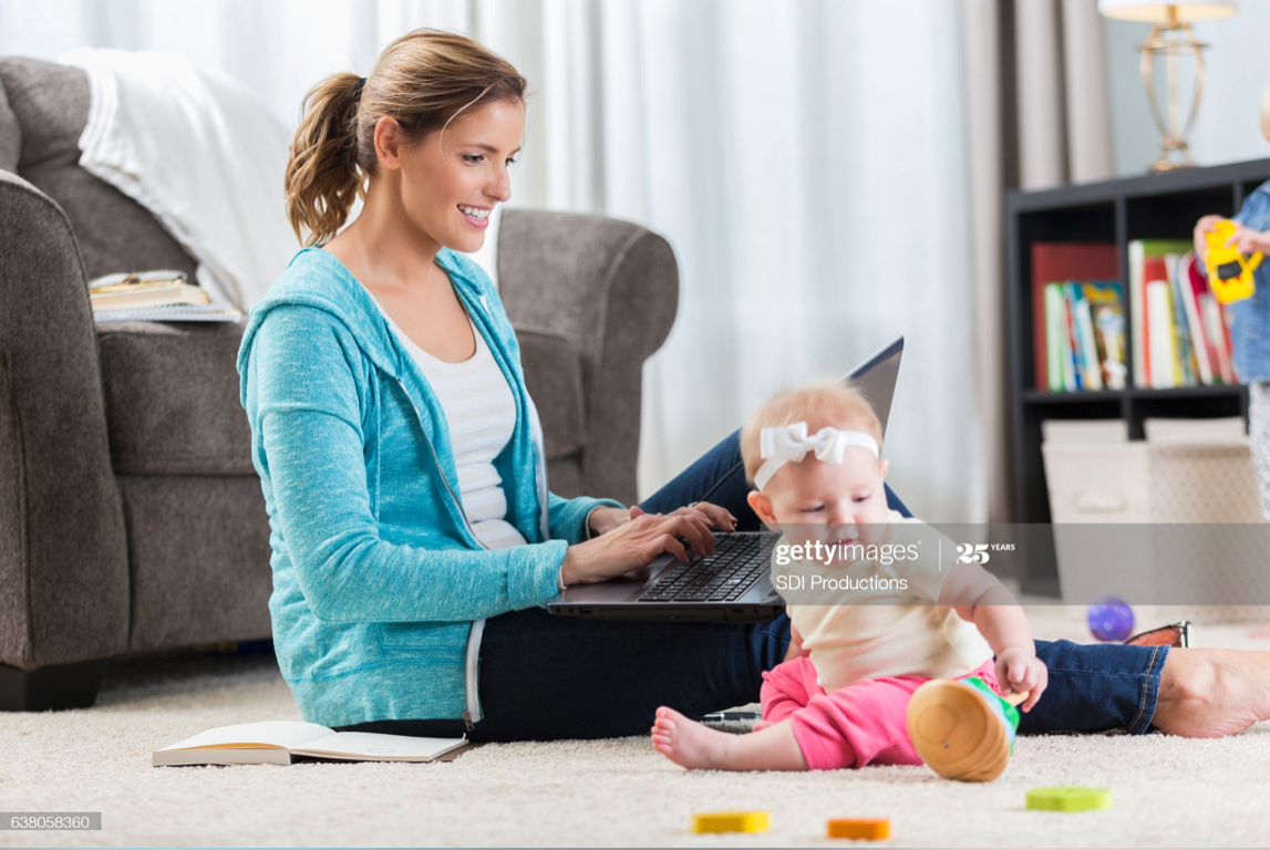 Stock photos of busy parents on the computer, rated for realism:1: Mom has both hands on computer, child seems to need no supervision at all. Work is getting done. Mom is even smiling! This sucks, 2 out of 10.