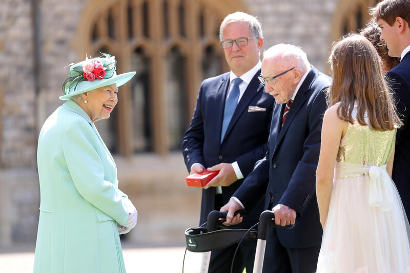 reuterspictures's tweet photo. Queen Elizabeth knights Captain Tom Moore, recognizing the 100-year-old for lifting Britain’s spirits during the gloom of the coronavirus pandemic by raising millions of pounds for health workers. Read more: https://t.co/55u4f3X6WG https://t.co/QWWTp8rT7j
