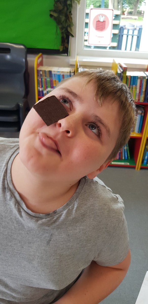 EndeavourClass's tweet image. We had a fun trying to eat chocolate without touching it! @normanbyspital