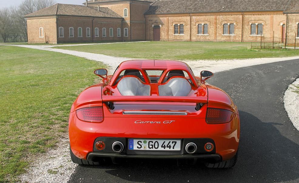 CARandDRIVER's tweet photo. The 2004 @Porsche Carrera GT defines magnificent: https://t.co/CyZwyHzRl3 https://t.co/1ykNhsNDqy