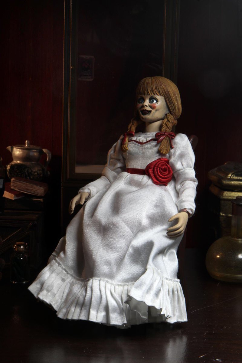 NECA_TOYS's tweet photo. Miss me? Brand new Annabelle 6” figure with real fabric dress and 2 brand new sculpted portraits. Window box packaging that recreates the look of her display case. https://t.co/0K7X5EWwHD