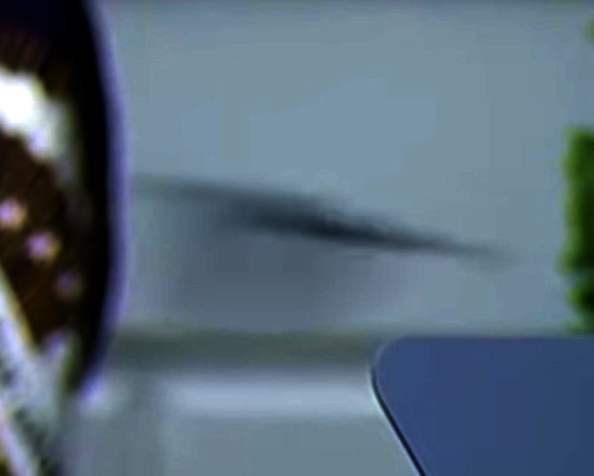 Here's clearest image I could get.I enhanced it.Now, all the cameras are using telephoto lenses. This thing flew BEHIND Trump, and telephotos cause lens compression.We don't know how far behind Trump it was.