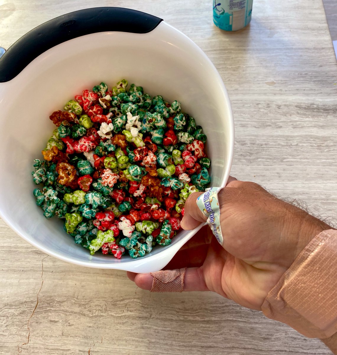 Casey's tweet photo. 🚨IMPORTANT LIFE ADVICE🚨 
do NOT, under any circumstances, try to make rainbow kettle corn - leave it to the pros. My kitchen is covered in molten plastic-like-sugar, my hands covered in 2nd degree burns and this shit is inedible. https://t.co/ac6ICeP6bs