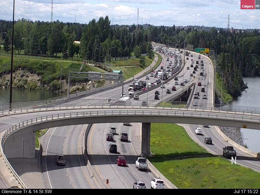 NewsRadioCGY's tweet photo. #yyctraffic Two big trucks have crashed on Glenmore Trail approaching 14th Street.
They're in the EB middle lanes; the gravel truck & 5-ton truck collision quickly stacking traffic past Crowchild.. so SB Crowchild will also start to #StackStackStack https://t.co/6YKUMKaq8L