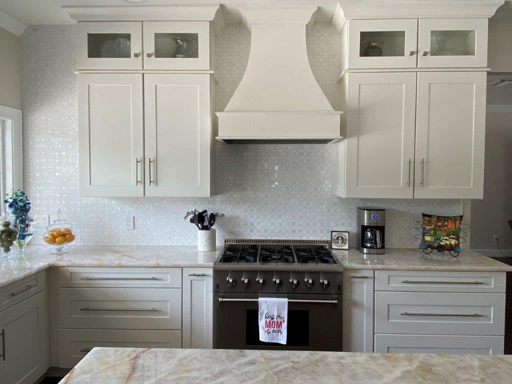 ceramictec's tweet photo. Finished up and got final photos of the Geometric pearl white thassos & shell tile backsplash in Tampa, Florida. This came out elegant! #tile #backsplash #thasso #geometric #shelltile #tampa #ceramictec https://t.co/TkFB4zZX0w