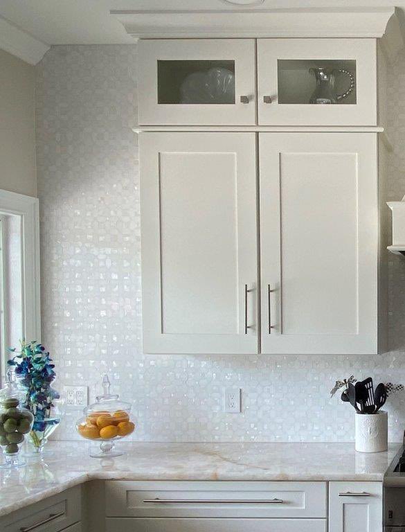ceramictec's tweet photo. Finished up and got final photos of the Geometric pearl white thassos & shell tile backsplash in Tampa, Florida. This came out elegant! #tile #backsplash #thasso #geometric #shelltile #tampa #ceramictec https://t.co/TkFB4zZX0w