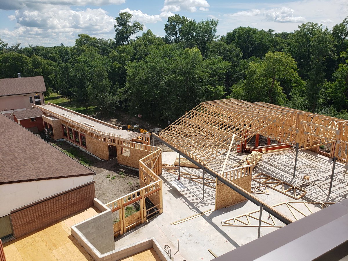 TylerK78's tweet photo. Construction continues on the Boyne Lodge Personal Care Home Project. The community space and link between the buildings is starting to take shape. A lot of work is taking place inside each of the homes. It's exciting to see the progression of the project. #carmanmb #carmanecodev https://t.co/aUd4nOyYCZ
