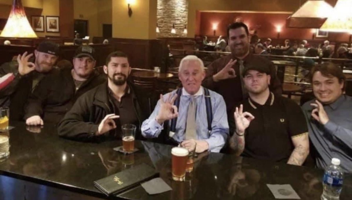 Oh, wow. Look. It's Roger Stone...Donald Trump's friend and henchman for 35 years with some playmates.

And what do you know...more white power signs.

Yeah, Donald Trump and MAGA 'love black people'

Don't sell me that BS.

These MF want to run an all-white world.