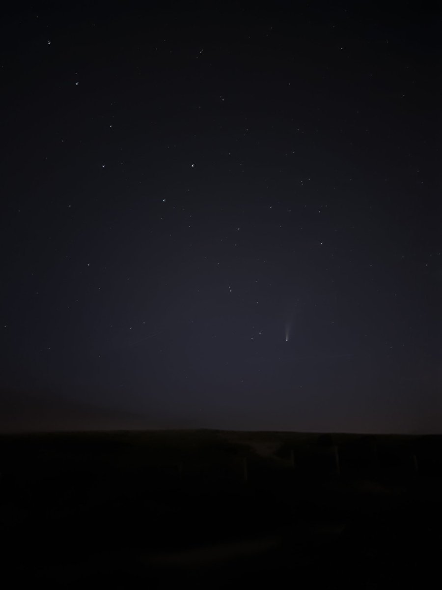 Anyone else wish this was a permanent view? Beautiful #cometNEOWISE over the dunes tonight ☄
