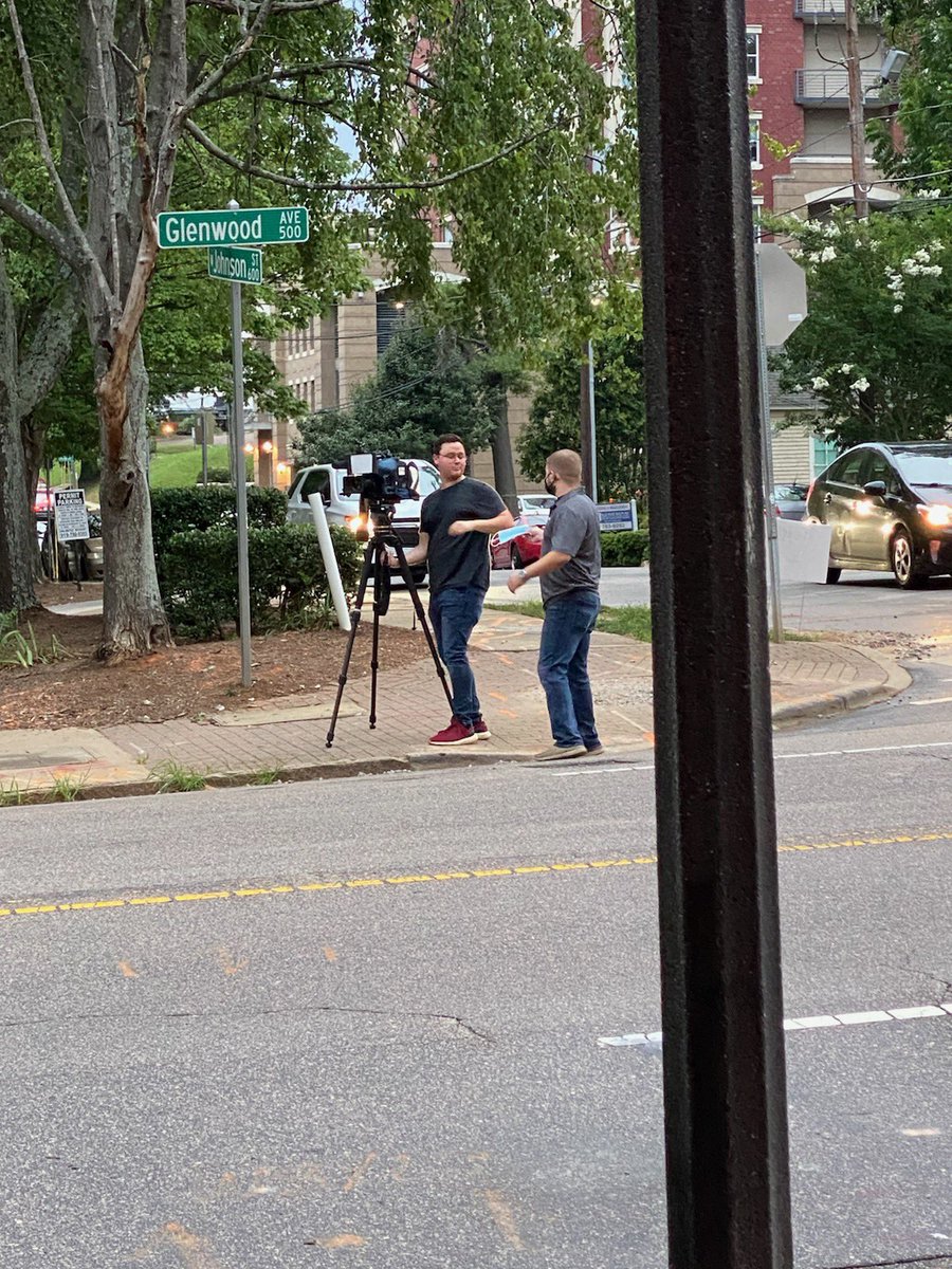 DerrickMaisonet's tweet photo. Local downtown worker giving a @WRAL cameraman a mask since he was out in the street without one. https://t.co/IDet9JYg0J