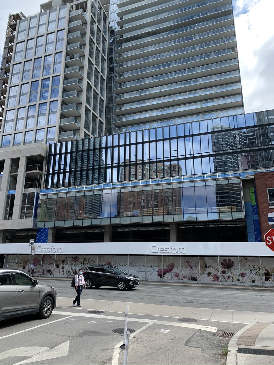 Clover Condos,  @_archAlliance_ with  @ERAarch. That faux brick building, marking the old site of  @barvolo, is not convincing. 20/