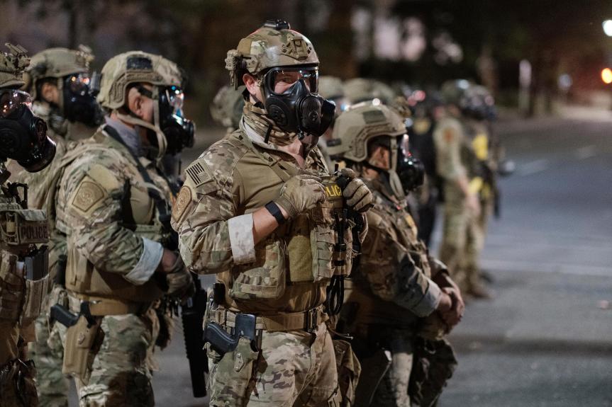 godlesswonder31's tweet photo. @SenJeffMerkley They're pretty clearly marked, even in this bad footage. Took me about 60 seconds on Google to identify them as wearing the official Homeland Security garb, patches and all. See here (Boston Herald); https://t.co/y56P57YR9l pic from that article shown here https://t.co/QJCKEoCGWI