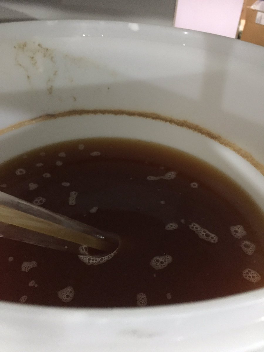After a week, the mash has finished fermenting - so I unrack it, siphoning it into a sterile jerry can