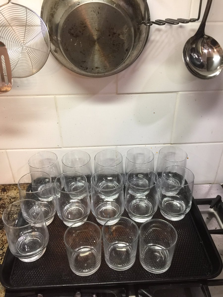 So now we distill a second time, and this time we pay attention to the temperatures - the first 200ml is thrown away, it’s methanol which is not good to drink. This evaporated at a lower temp than ethanol (whichbwe do want)I have a series of glasses lined up that I will fill